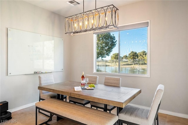 dining area with a water view