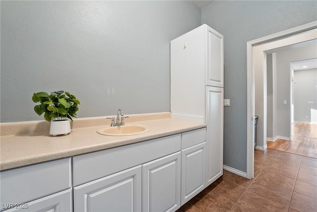 bathroom with vanity and tile patterned floors