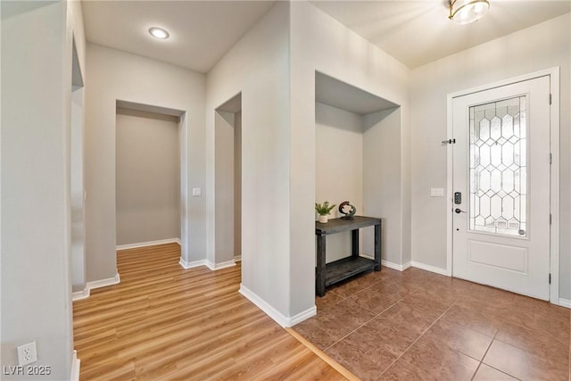 foyer with hardwood / wood-style flooring