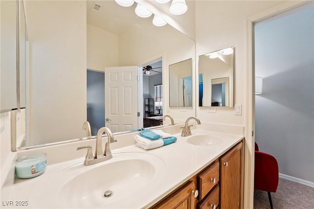 bathroom with vanity and ceiling fan