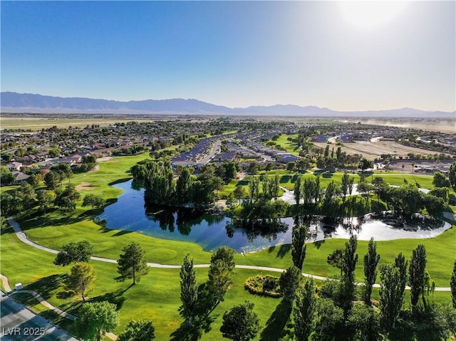 bird's eye view with a water and mountain view