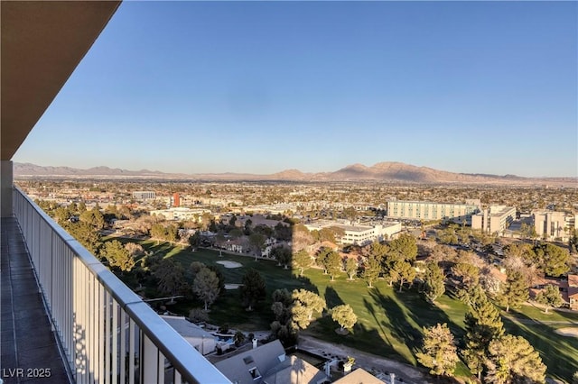 balcony featuring a mountain view