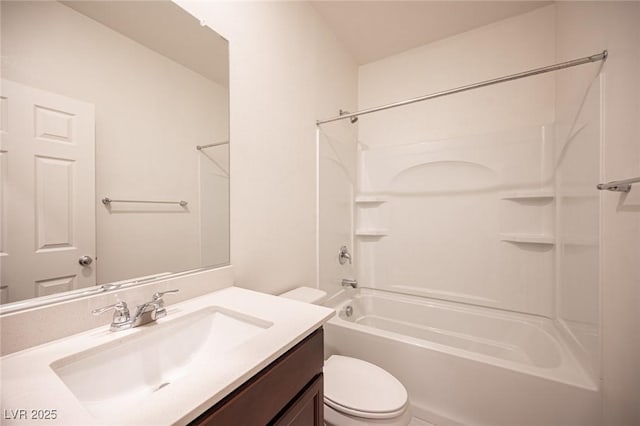 full bathroom featuring vanity,  shower combination, and toilet