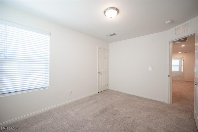 view of carpeted spare room