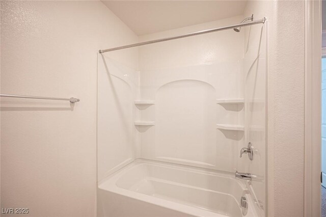 bathroom with shower / tub combination