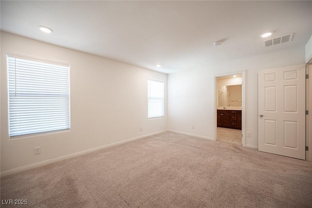 view of carpeted spare room