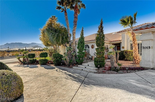 view of front of house with a mountain view