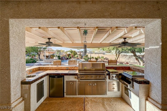 view of patio with area for grilling and ceiling fan