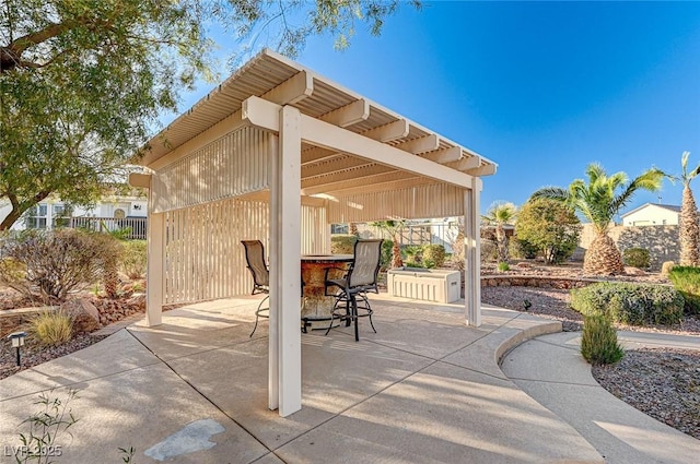 view of patio with a bar