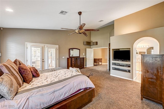 carpeted bedroom with vaulted ceiling, ceiling fan, and access to outside