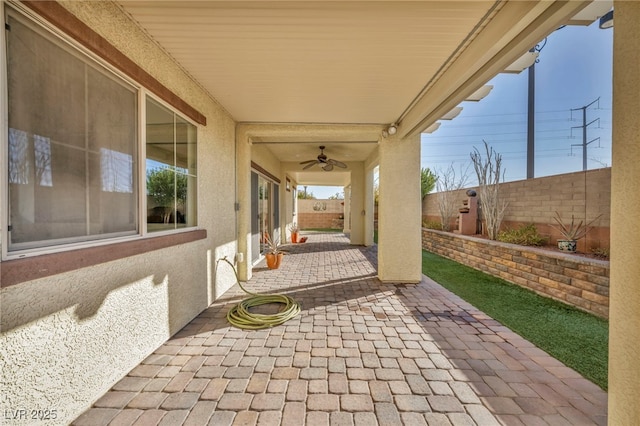 view of patio with ceiling fan