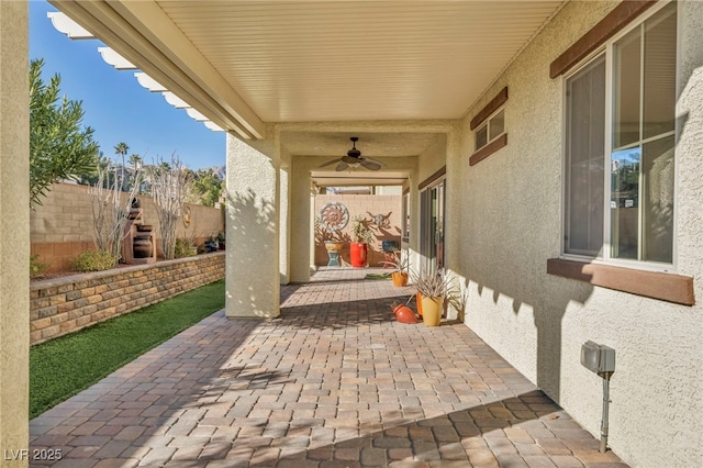 view of patio / terrace with ceiling fan