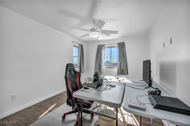 office area featuring ceiling fan and dark hardwood / wood-style flooring