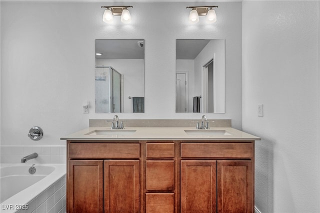 bathroom with plus walk in shower and vanity