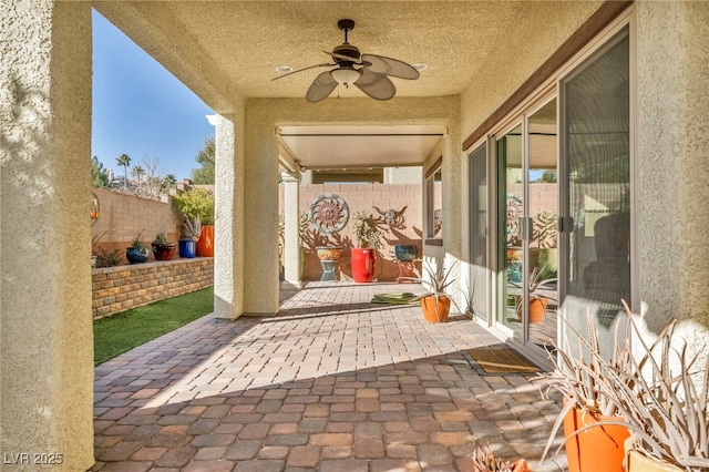 view of patio / terrace featuring ceiling fan