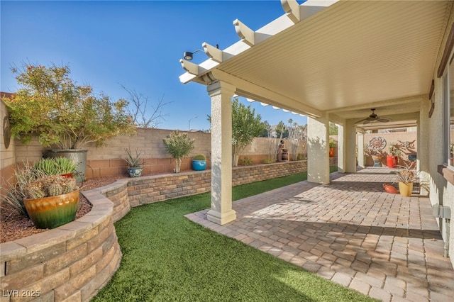 view of patio / terrace featuring ceiling fan