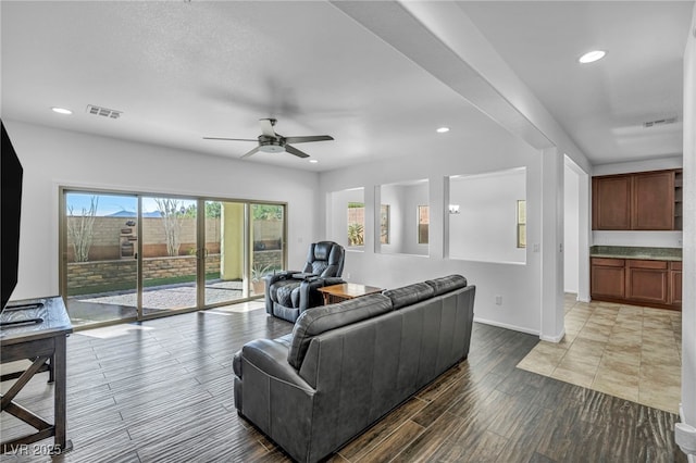 living room with ceiling fan