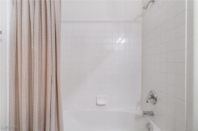 bathroom with shower / bath combo