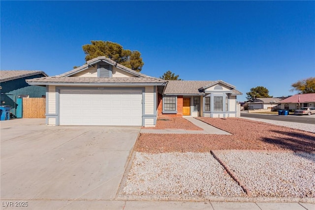 single story home featuring a garage