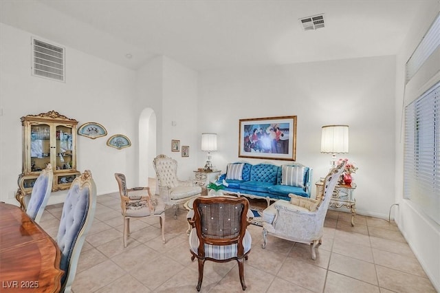 living room featuring light tile patterned flooring