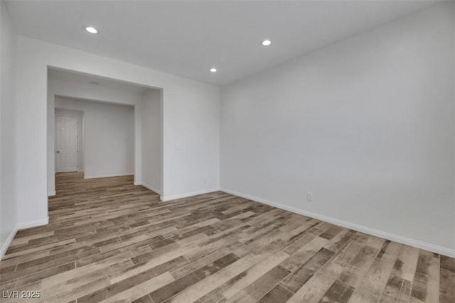 unfurnished room featuring light hardwood / wood-style flooring