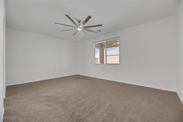 empty room with carpet and ceiling fan