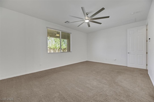 empty room with carpet floors and ceiling fan