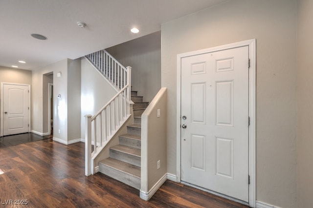 entryway featuring dark wood-type flooring