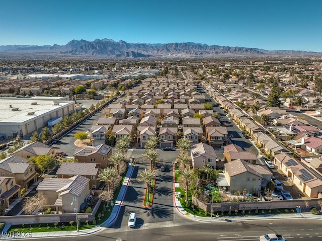 birds eye view of property featuring a mountain view