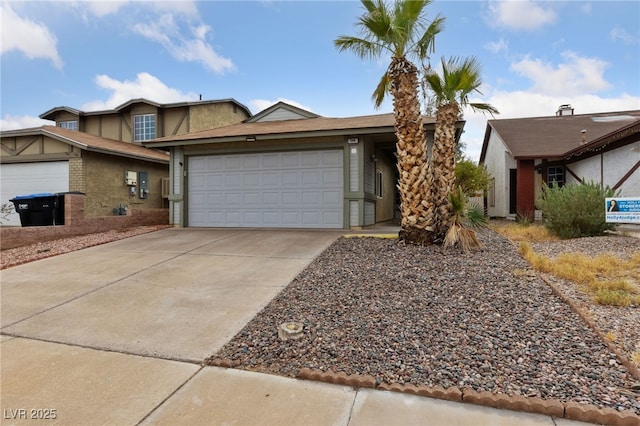 view of front of property featuring a garage