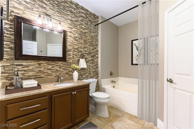 bathroom featuring backsplash, vanity, toilet, a bath, and tile patterned floors