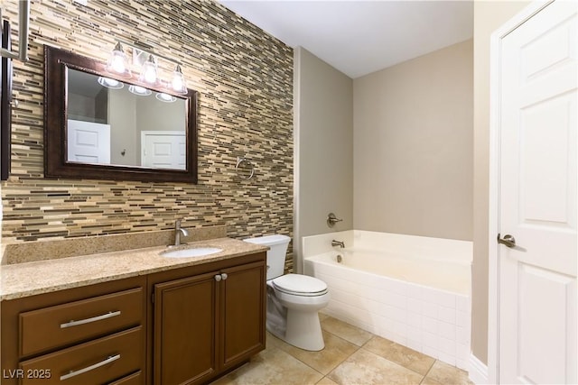 bathroom featuring vanity, a bath, backsplash, and tile patterned floors