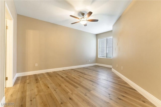 empty room with light hardwood / wood-style floors and ceiling fan