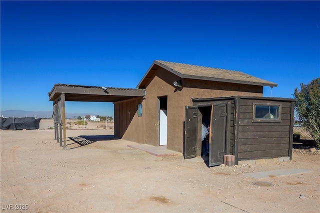 exterior space with an outdoor structure