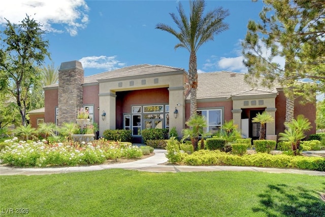 view of front of property with a front lawn