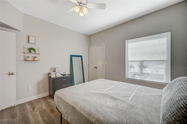 bedroom featuring ceiling fan and wood-type flooring