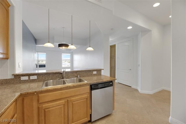 kitchen with pendant lighting, dishwasher, sink, light tile patterned floors, and light stone countertops