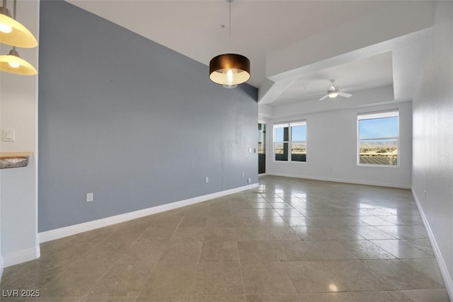 unfurnished room featuring ceiling fan