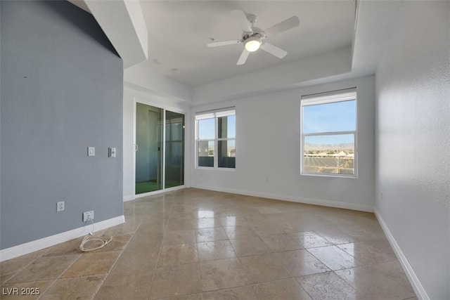 unfurnished room featuring ceiling fan