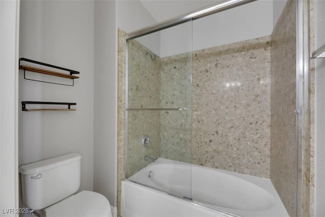 bathroom with shower / bath combination with glass door and toilet