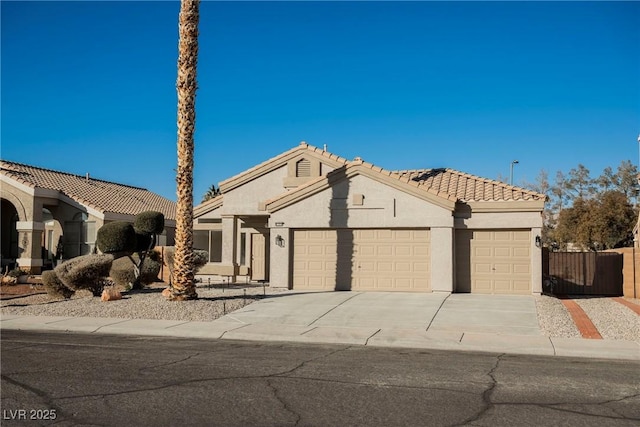 view of front of property with a garage