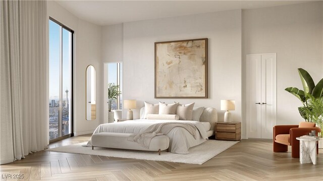 bedroom featuring light parquet flooring and access to exterior