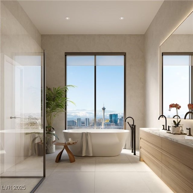 bathroom featuring vanity, tile patterned flooring, and a washtub