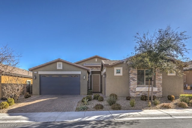 single story home with a garage