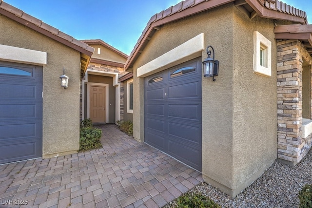 property entrance featuring a garage