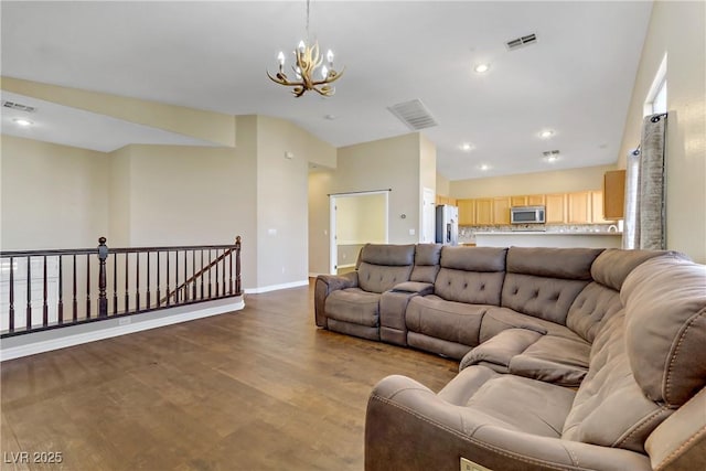 living room featuring hardwood / wood-style floors and a chandelier