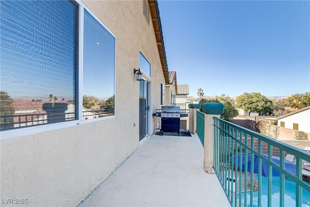 balcony featuring a grill