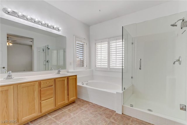 bathroom featuring ceiling fan, vanity, independent shower and bath, and tile patterned flooring