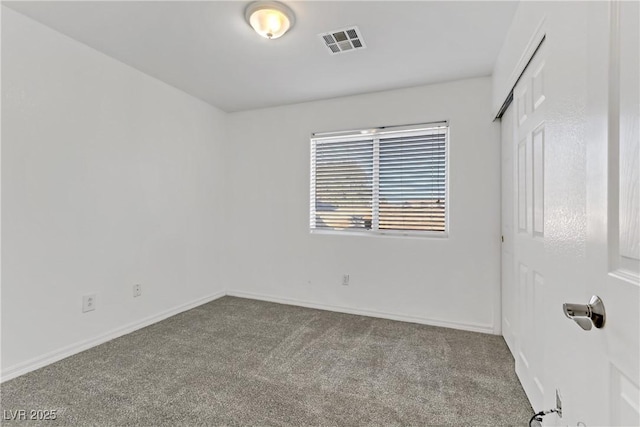 spare room with carpet flooring