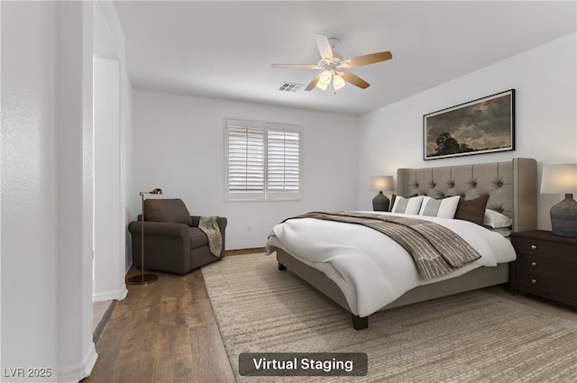 bedroom with hardwood / wood-style flooring and ceiling fan